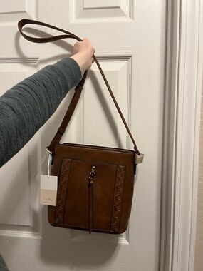 Classic Brown Textured Crossbody Bag with Tassel Accent